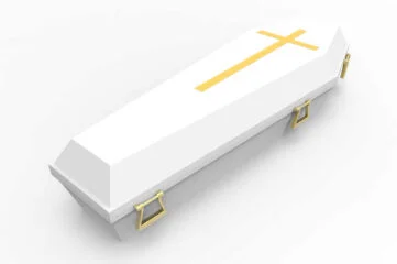White coffin with a cross meaning christian burial