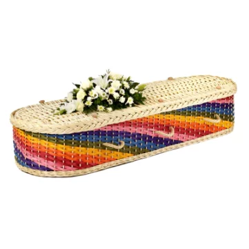 A bright colourful rainbow coffin with diagonal stripes and a light natural coloured lid.